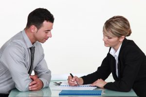 15627291 - woman explaining contract to man 15627291 - woman explaining contract to man